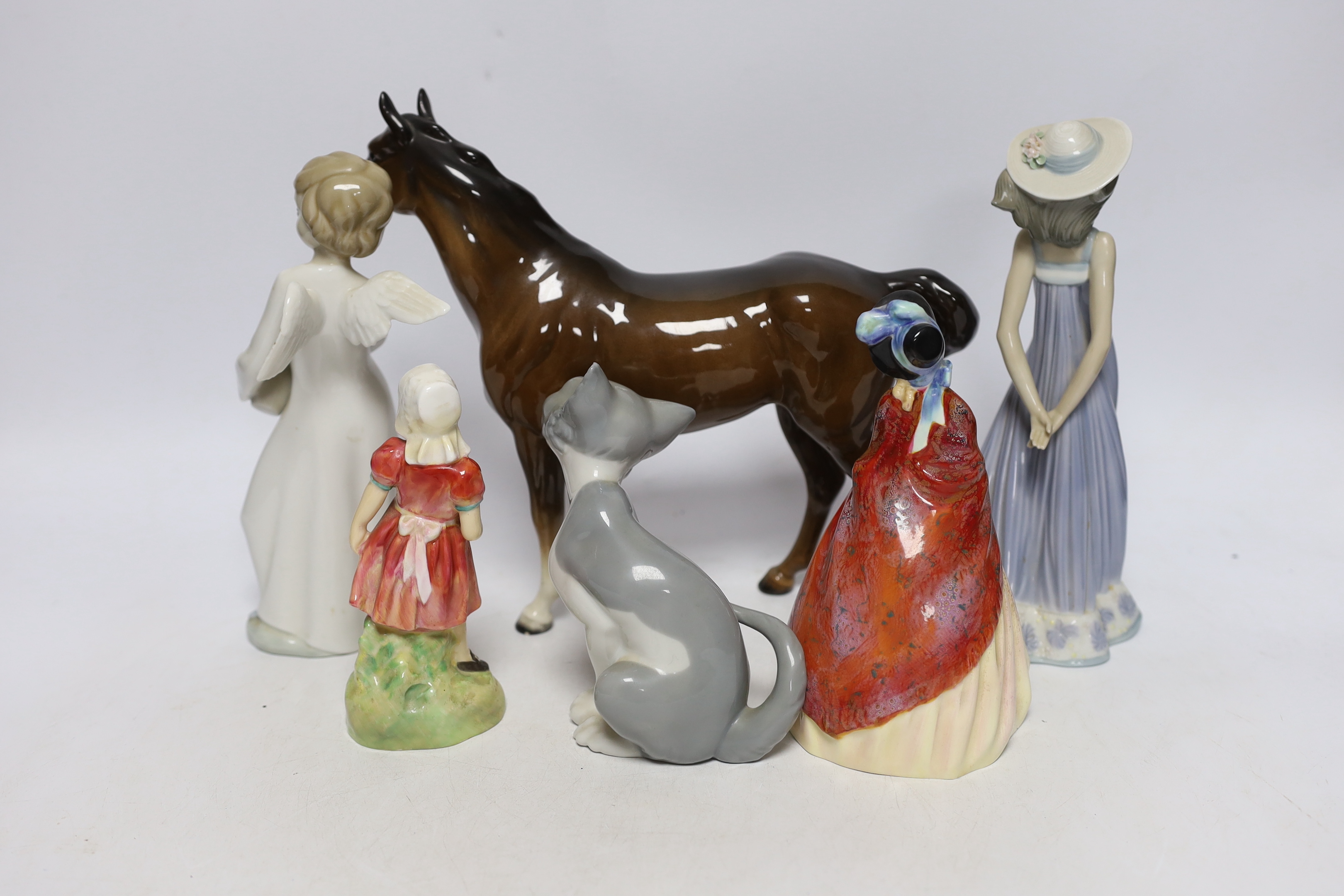 Two Royal Doulton figures, three Lladro and a Beswick horse, tallest 22cm high